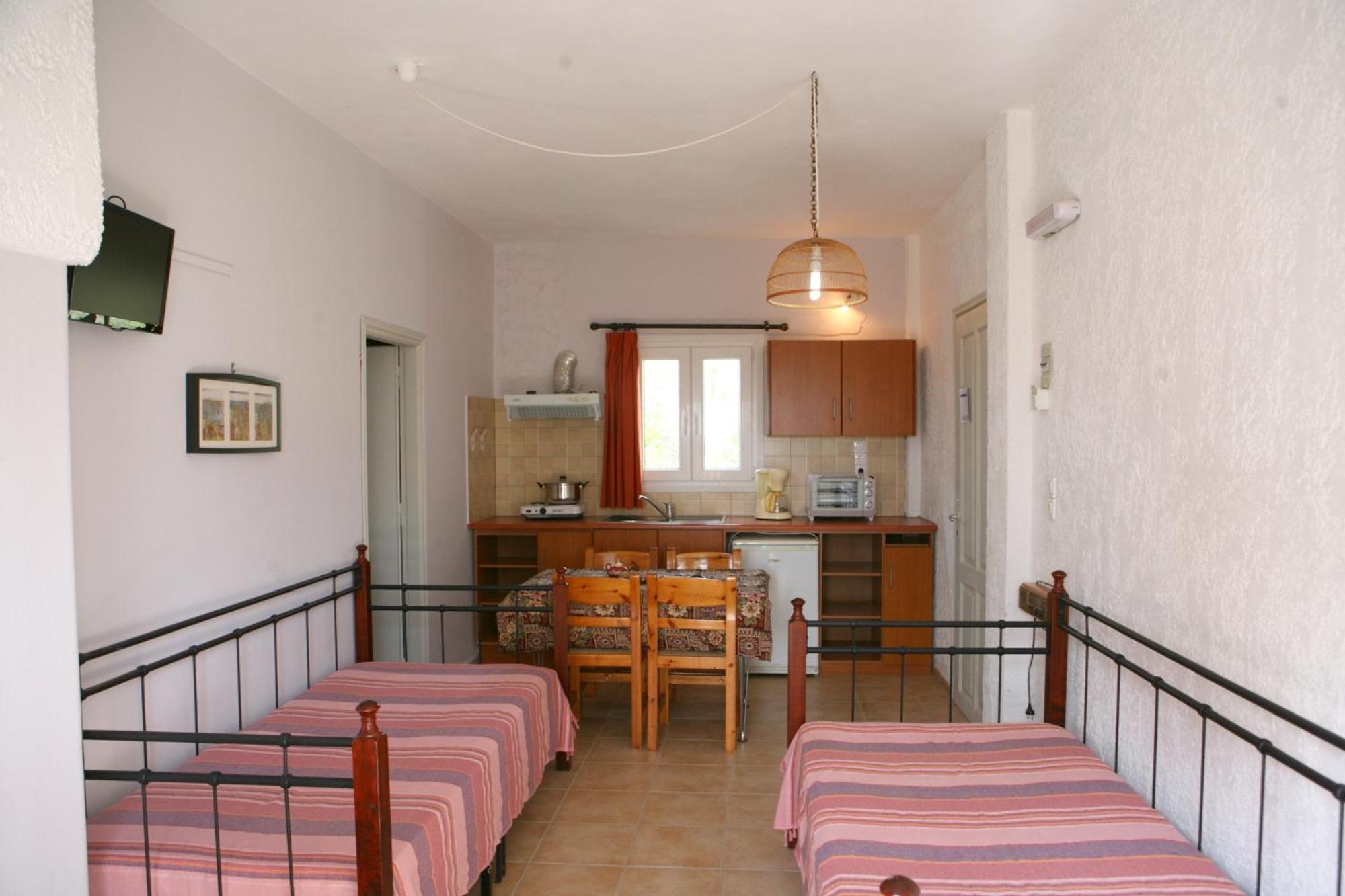 9 Musses Hotel Apartments Skala Mistegnon Стая снимка